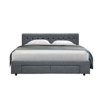 Side view of queen grey bed frame highlighting fabric texture and supportive wooden slats.