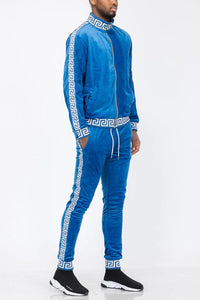 Blue and white velour track jacket and pants set displayed flat for product view.