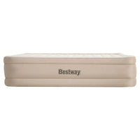 Bestway air bed partially deflated, placed inside a tent with outdoor scenery visible.