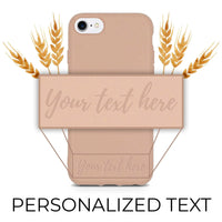 Pastel pink biodegradable phone case shown with its natural texture on a white background.