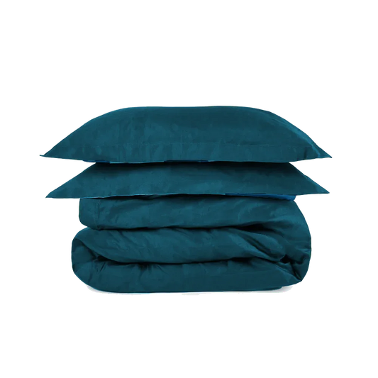 Teal super king duvet set from The House Babylon Collection displayed neatly on a bed, showing smooth 600-thread count cotton