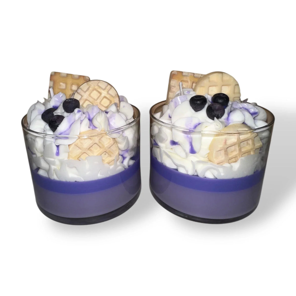 Two Blueberry Waffle decorative candles placed together showing realistic blueberry details.