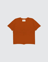Burnt orange short sleeve top for kids, displayed on a white background