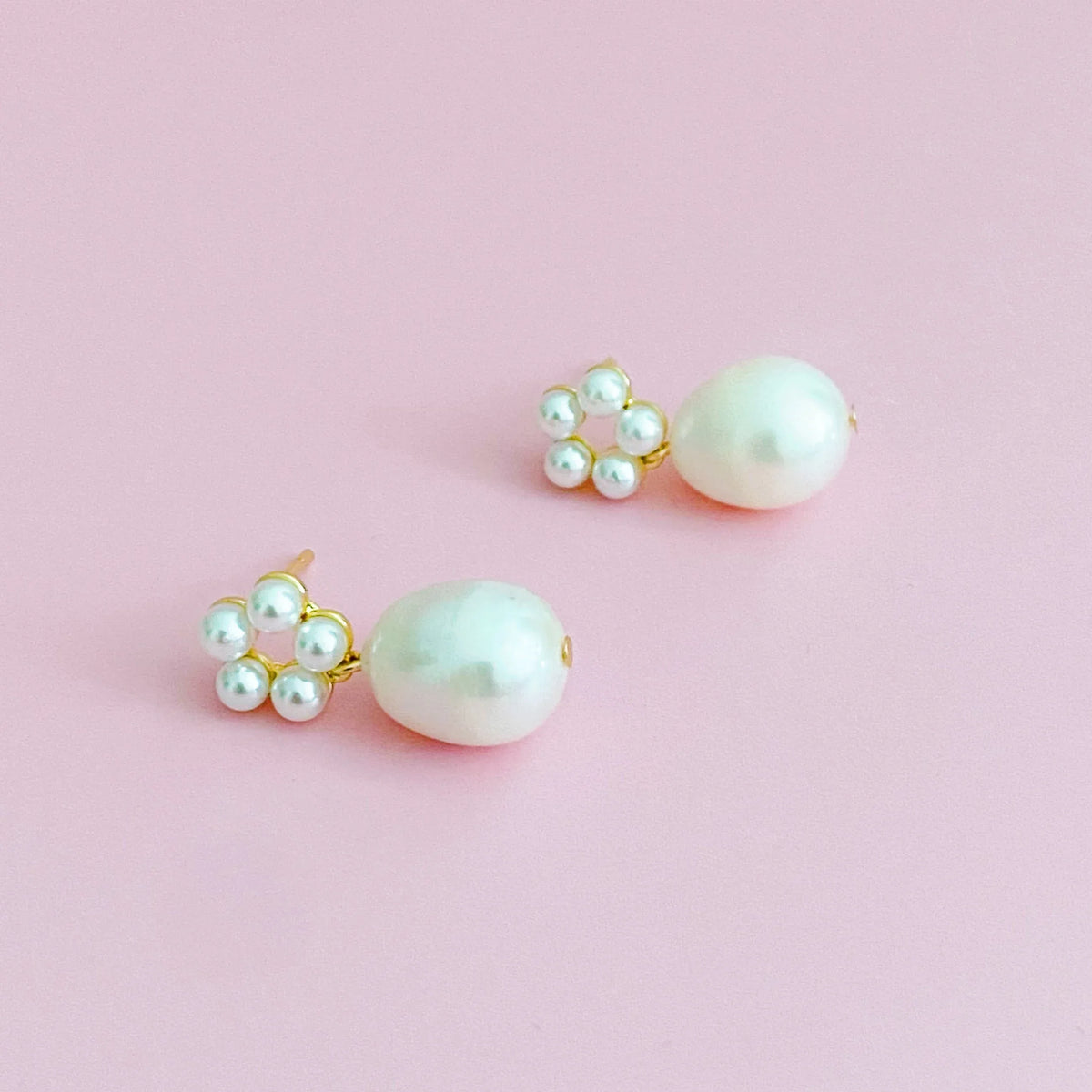 Blooming Freshwater Pearl Drop Earrings displayed on a white background highlighting gold-plated brass and pearl details.