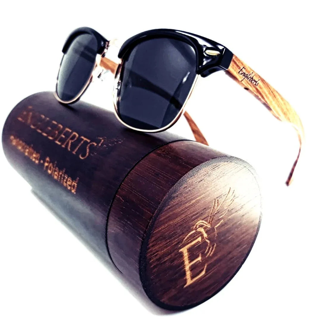 Close-up of walnut wood sunglasses partially inside an eco-friendly bamboo case with microfiber pouch.