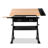 Side view of drafting table showing slide-out tray under wood top and storage drawers on the side.