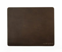 Dark brown full grain leather mouse pad with a smooth finish on a white background.