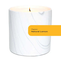 Three handcrafted white marble ceramic candle vessels with black and gray swirls, shown individually on white.