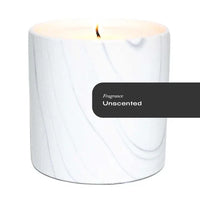 White marble ceramic container with lovely gray and black swirls holding an unscented candle.