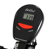 Close-up of spin bike handlebar with resistance control knob