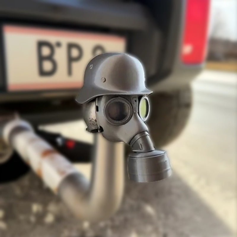 3D - printed trailer hitch cover with steel helmet and gas mask design. Protects the receiver tube from rusting.