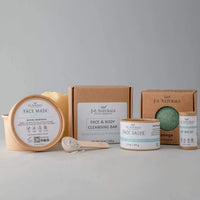 Hydrate skincare kit components arranged neatly, highlighting natural ingredients for dry skin.