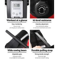 User gripping rowing machine handles demonstrating ergonomic design and quiet operation.