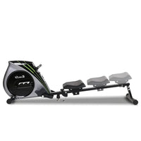 Rowing machine displayed in a home gym setting with visible large LCD console