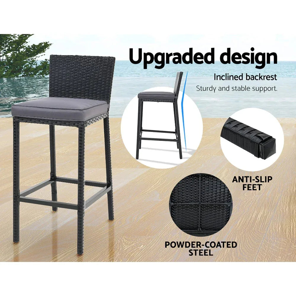 Gardeon outdoor bar set with matching stools placed on patio floor