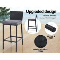 Gardeon outdoor bar set with matching stools placed on patio floor