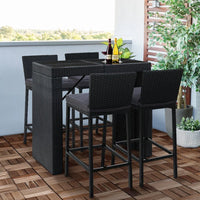 Close-up detail on rattan weave and foam cushions of outdoor bar stools