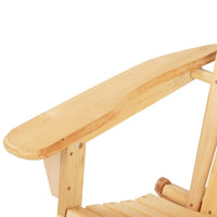 Wooden Adirondack chair with wide armrests beside small plants on wood deck.