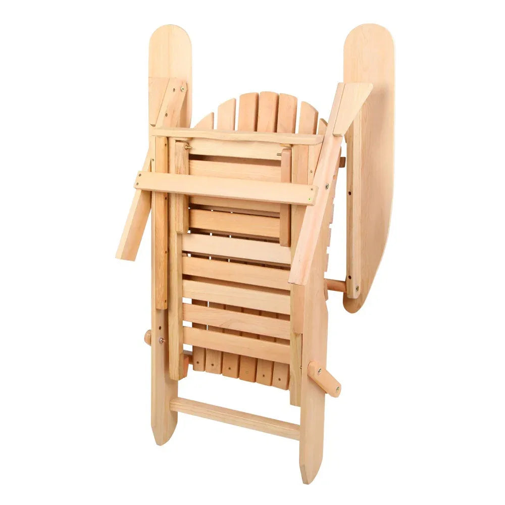 Outdoor Adirondack chair paired with slide-out ottoman in natural finish on stone surface