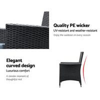 Close detail of woven black PE rattan chair armrest and cushion texture