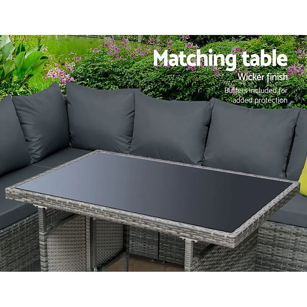 Gardeon patio furniture arranged for lounging with cushioned seats and coffee table.