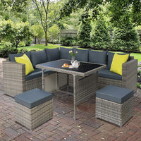 Front view of outdoor wicker furniture set with ottoman and corner seats.