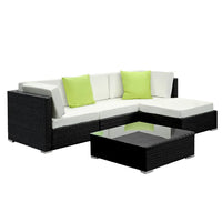 Gardeon black 5-piece outdoor wicker sofa set arranged on patio with cushions