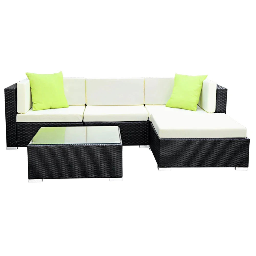 Gardeon outdoor sofa set with glass-top table and cushioned seats under sunlight