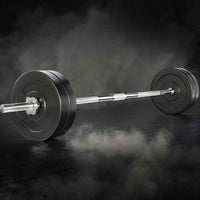 Black rubber weight plates with textured grip handles
