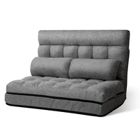 Folded grey Artiss lounge sofa bed placed on floor showing fabric texture and compact design.