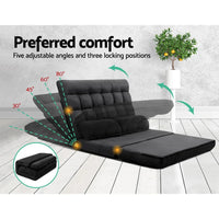Charcoal lounge sofa bed folded into a seat with backrest at an angle on floor.