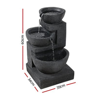 Close-up of blue three-tier solar bird bath fountain showing water cascading over edges