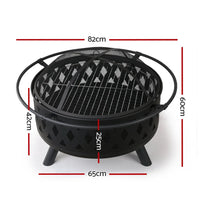 Close-up of fire pit grill ring showing stainless steel grill plate and ventilation holes