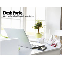 Detail of drawer handle and shelf compartments on white office computer desk.