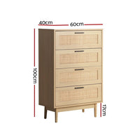 Side angle of rattan tallboy showing woven texture and smooth drawer fronts with wooden handles.