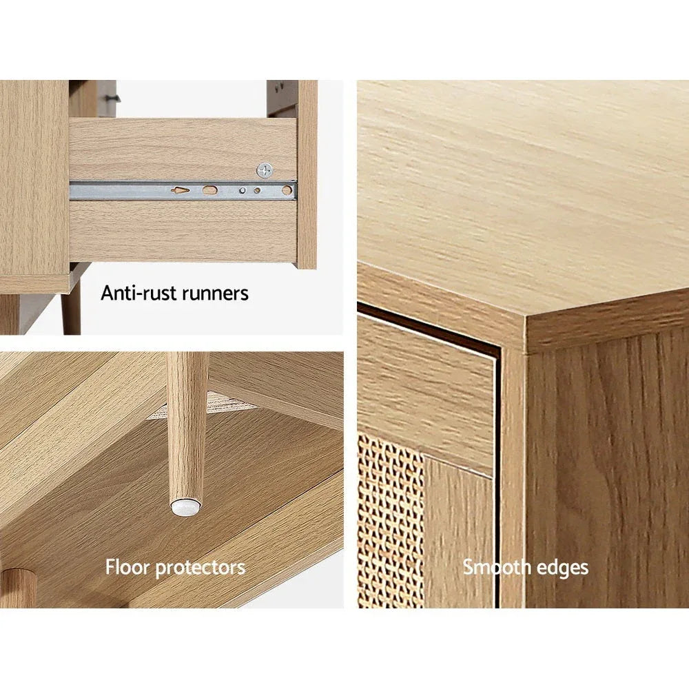 Close-up of the cabinet base with angled wooden legs supporting the rattan chest.
