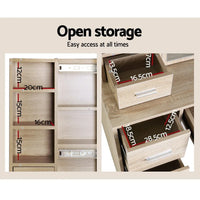 Dressing table showing multiple storage compartments and sliding mirror in modern design.