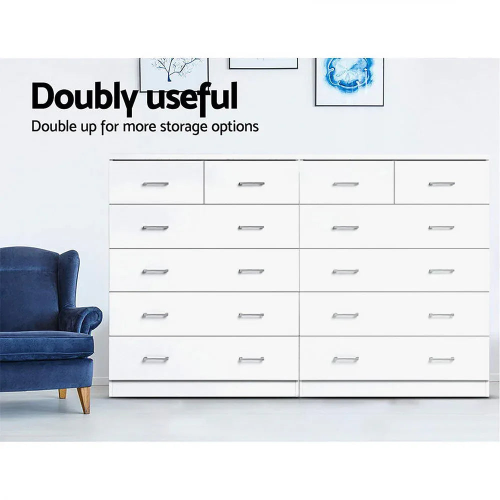 White dresser with six drawers placed in modern bedroom setting.