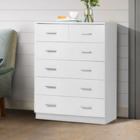 Top corner view highlighting melamine finish and clean lines of tallboy dresser.