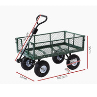 Close-up of green mesh steel garden cart wheel and steel frame.