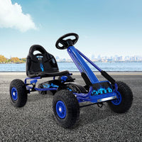 Blue kids pedal go kart racing bike positioned to show full body and wheels.
