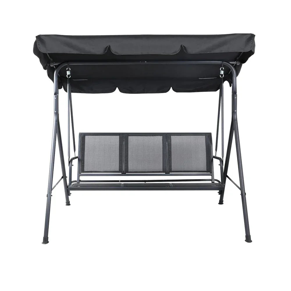 Swing chair with canopy in shaded outdoor garden setting, showing adjustable shade cover