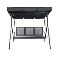 Swing chair with canopy in shaded outdoor garden setting, showing adjustable shade cover
