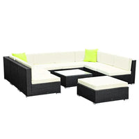 Storage cover included with the 10-piece outdoor wicker sofa set shown folded.