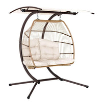 Gardeon hanging egg chair with broad adjustable canopy on steel frame in outdoor garden setting.