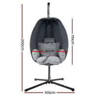 Side view of grey hanging egg chair with soft cushion and steel frame.