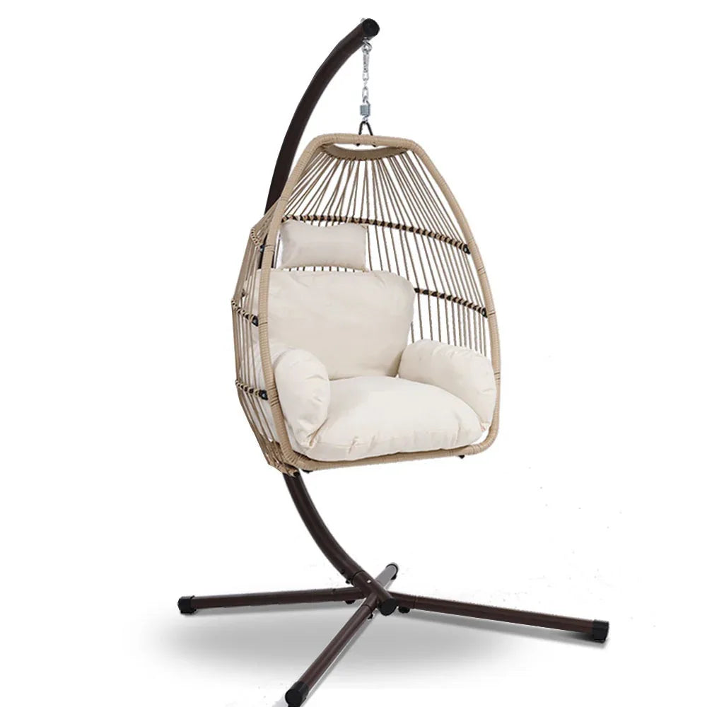 Close-up of the woven wicker rattan texture on the hanging egg swing chair.