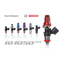 Injector Dynamics ID1050x fuel injector with a sleek metallic design on a white background.