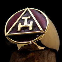 Red enamel Masonic ring displayed beside its black cushioned jewelry box.