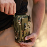 Tactical MOLLE pouch open with contents showing organized interior compartments.